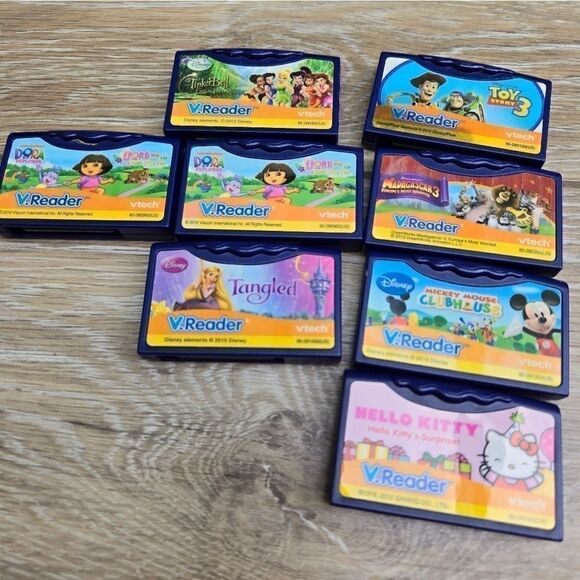 8 V.Reader games V-tech learning games - Picture 1 of 3